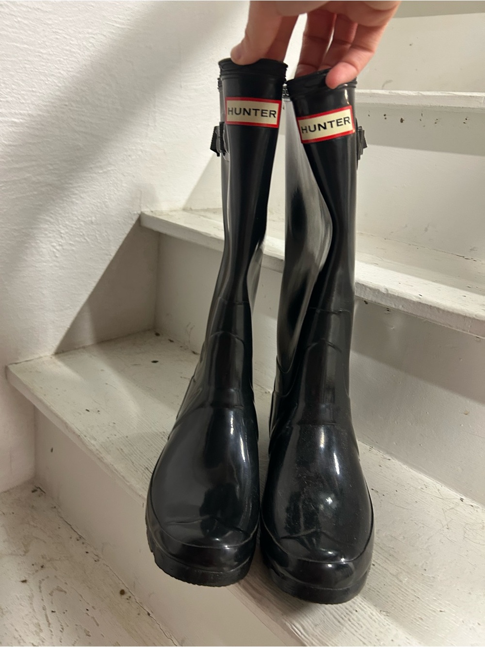 Tall black Hunter rain boots
